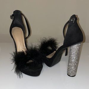 Black furry heels